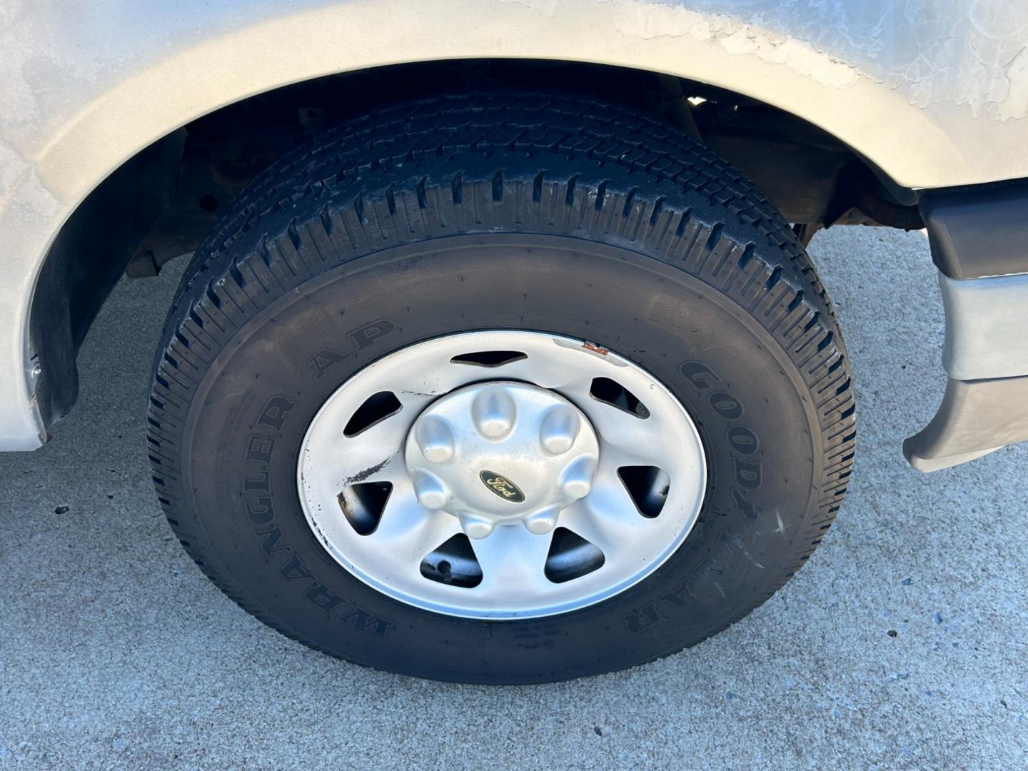 2003 GRAY /Gray Ford F-150 XL Long Bed 2WD (2FTPF17Z43C) with an 5.4L V8 SOHC 16V engine, AUTOMATIC transmission, located at 17760 Hwy 62, Morris, OK, 74445, (918) 733-4887, 35.609104, -95.877060 - 2003 FORD F-150 HAS THE 5.4 TRITON ENGINE AND IS 2WD. THIS TRUCK HAS MANUAL SEATS, MANUAL WINDOWS, MANUAL LOCKS, AMFM STEREO, CASSETTE PLAYER, BEDCOVER, ONLY 48,847 ACTUAL MILES!! CLEAN TITLE AND FREE CARFAX REPORT GOODYEAR 245/75R16 TIRES ***DOES HAVE SOME RUST AND PAINT DAMAGE AS SHOWN IN THE PI - Photo#16